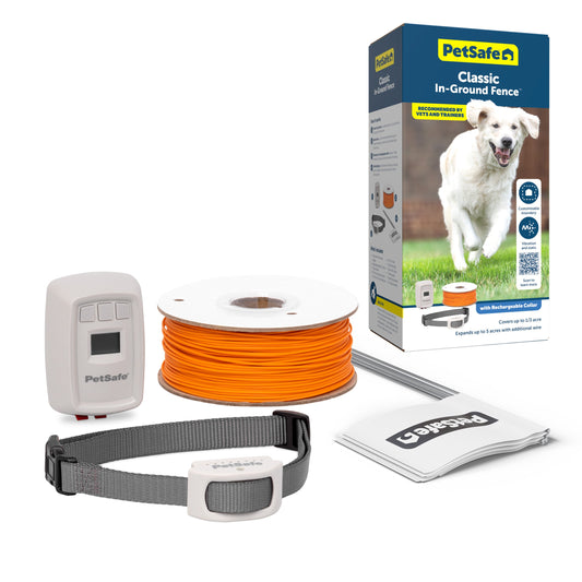 PetSafe dog fence kit with receiver, cable, collar, and packaging on a white background