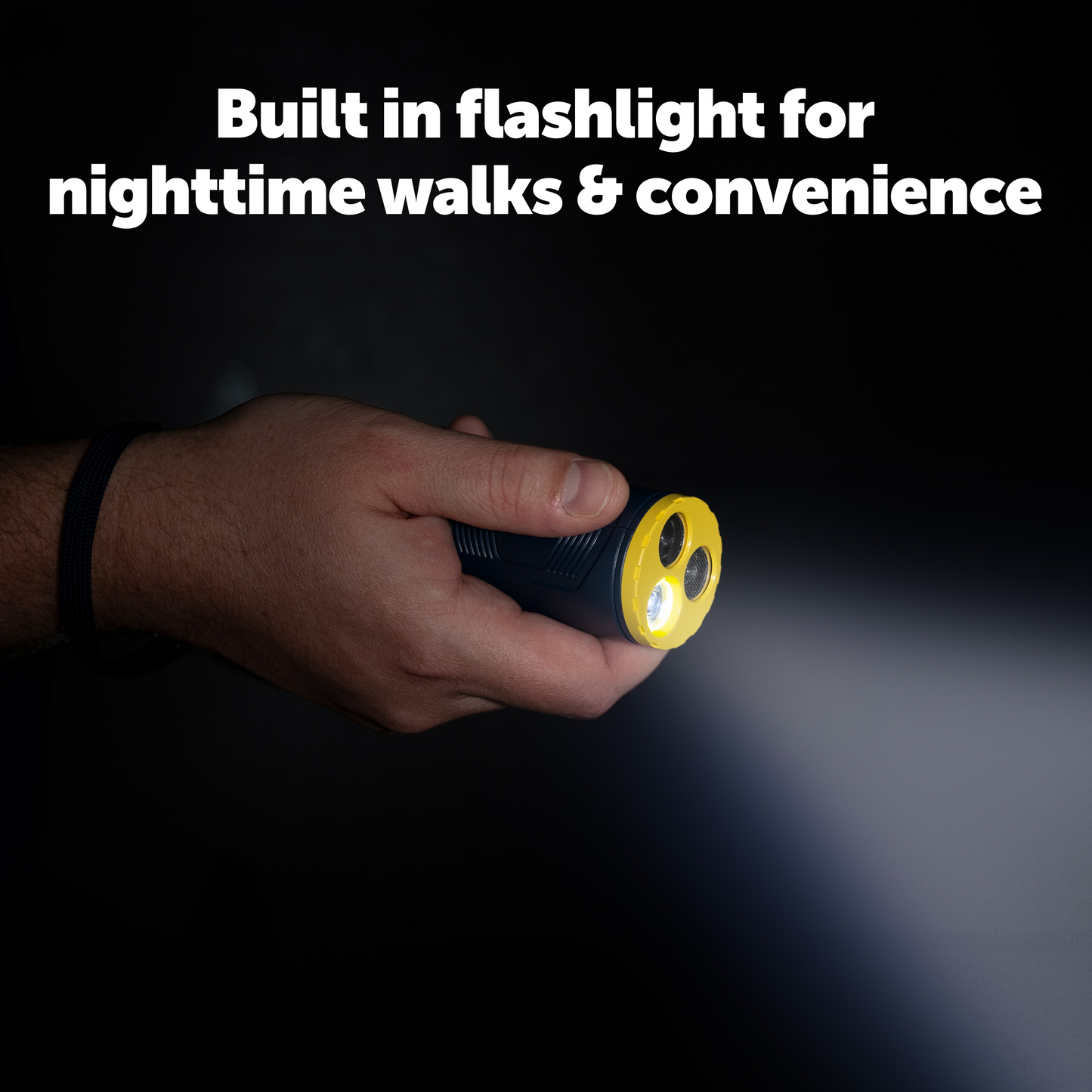 Hand holding a flashlight with text about nighttime walks and convenience