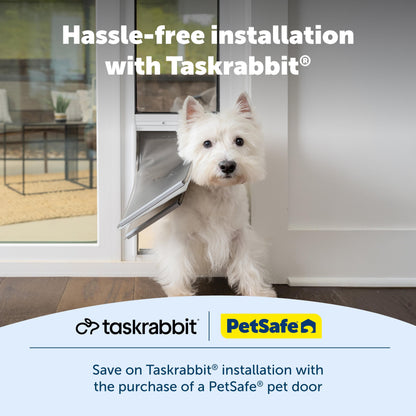 Dog using a PetSafe pet door with Taskrabbit and Petsafe branding.