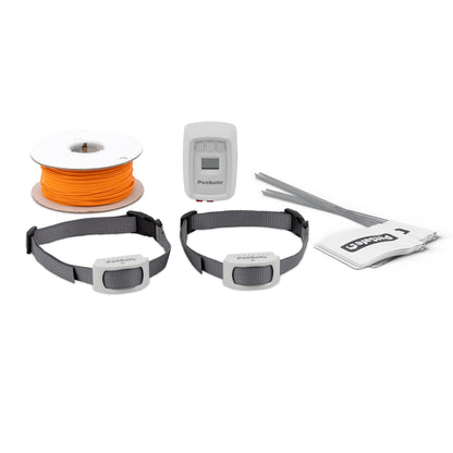 Pet training collar system with two collars, a remote, and a spool of orange cable on a white background.